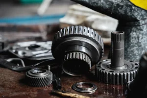 close-up-mechanical-parts-of-car-in-the-garage-2026-01-09-06-47-49-utc